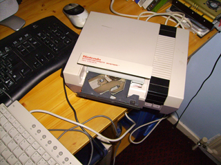 NES PC Showing the cd drive tray under the cartridge slot cover